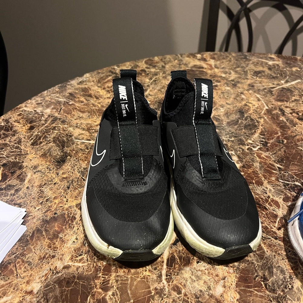 Nike Black and White Slip-On Sneakers